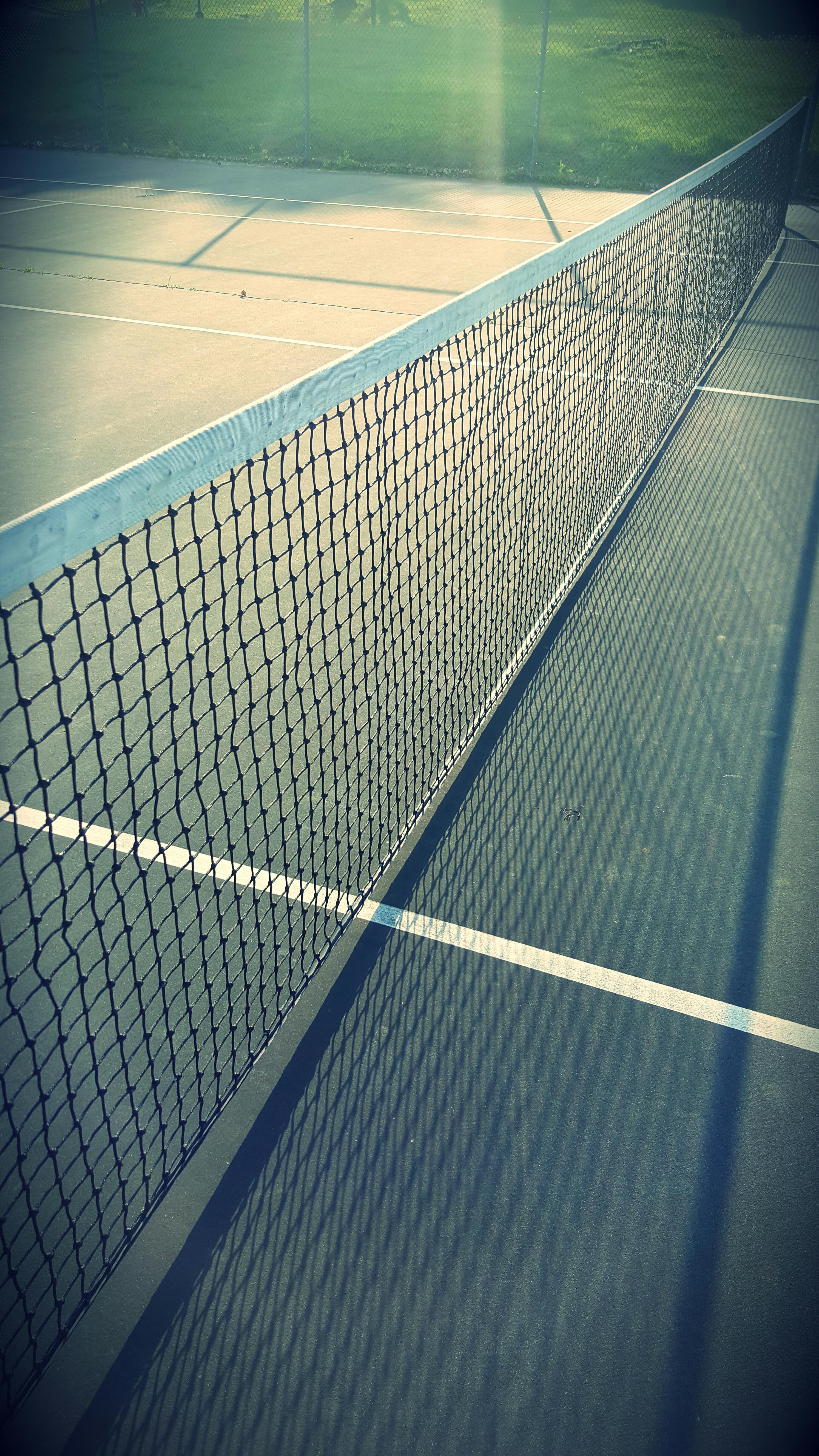 A close up shot on a tennis court